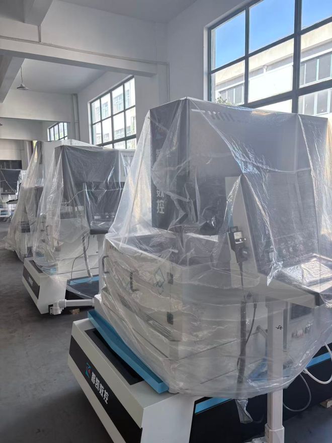 中山贴标机加工效率之谜：智凯数控中走丝实测揭秘(图2)